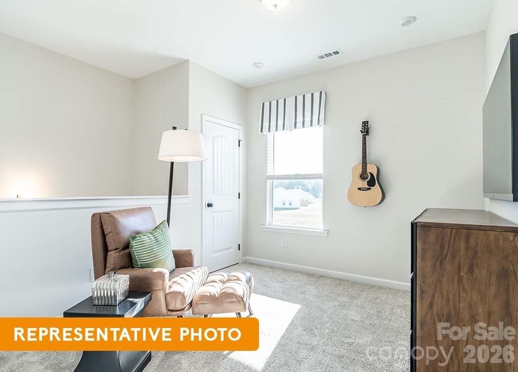 5423 Arnold Way Concord, NC 28025 - Photo 13 of 19 a view of living room with furniture and window