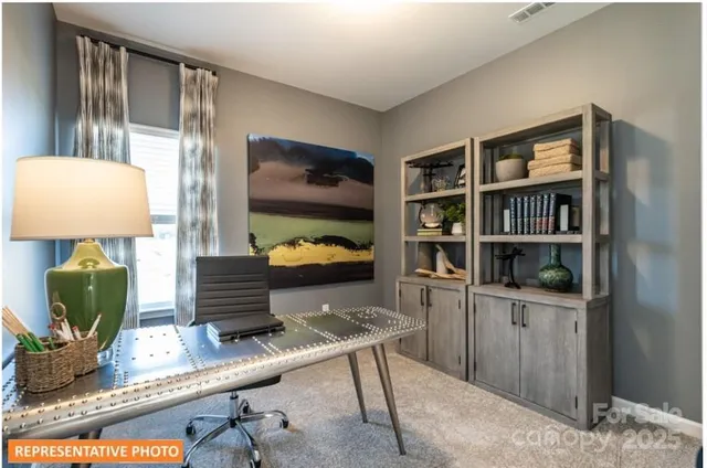 a room with furniture and a book shelf