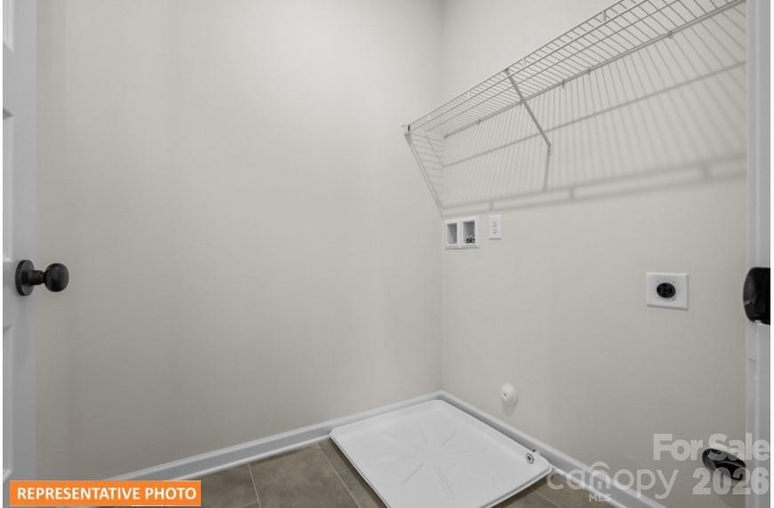 5423 Arnold Way Concord, NC 28025 - Photo 18 of 19 a view of a room with racks on the wall