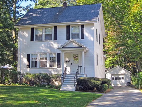 55 Spring Street Lexington, MA 02421 - Photo 1 of 1 a front view of a house with garden