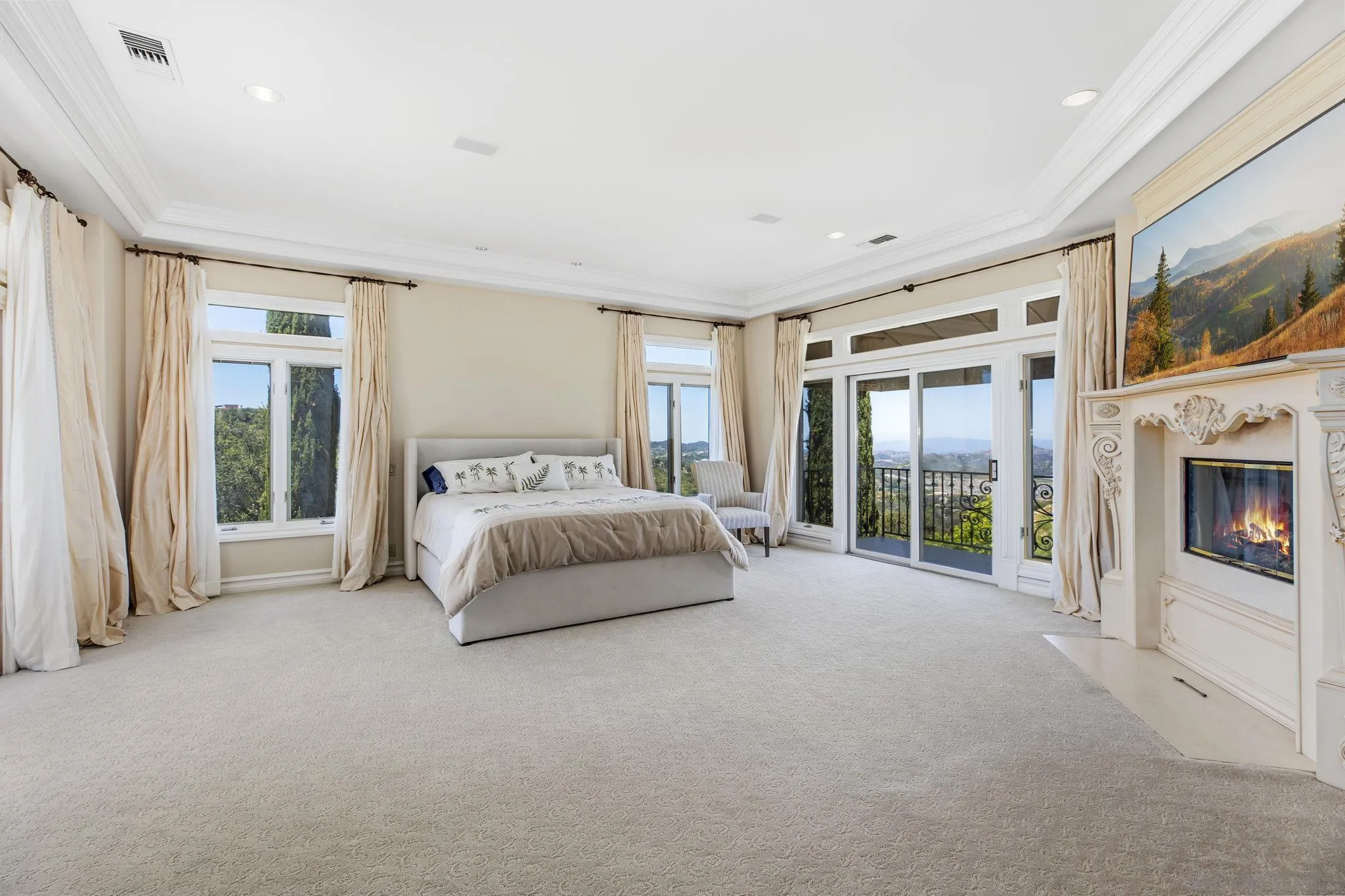14440 Ridge Ranch Road Valley Center, CA 92082 - Photo 52 of 73 a spacious bedroom with a large bed and a flat tv screen