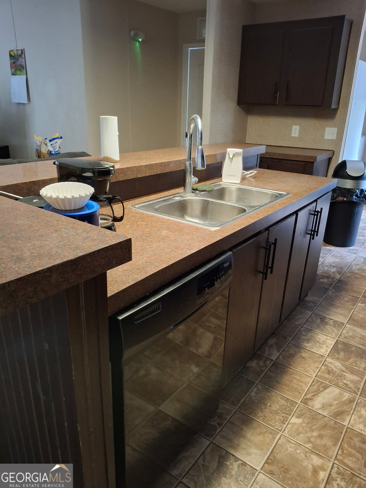 163 Indigo Road Lyons, GA 30436 - Photo 18 of 18 a bathroom with a sink and a mirror