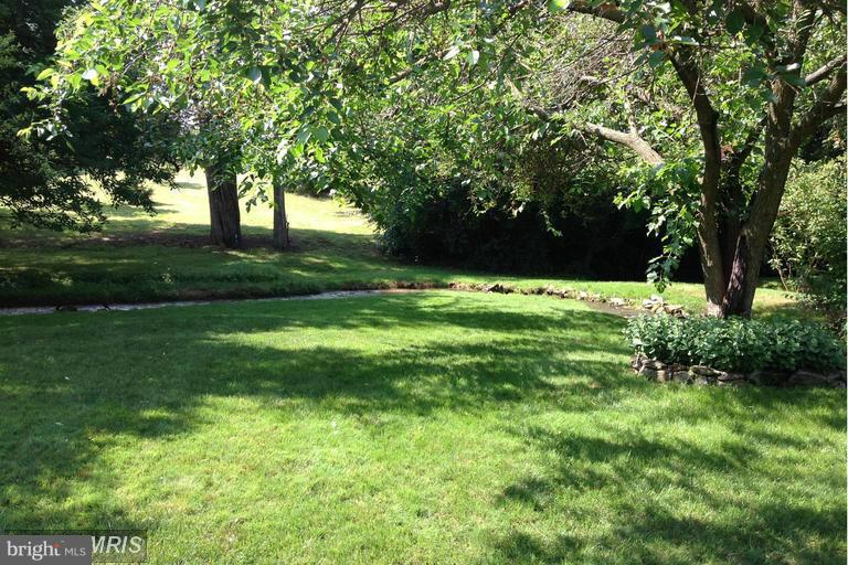 2402 Hoffman Road Greencastle, PA 17225 - Photo 19 of 22 a view of green field with trees in the background