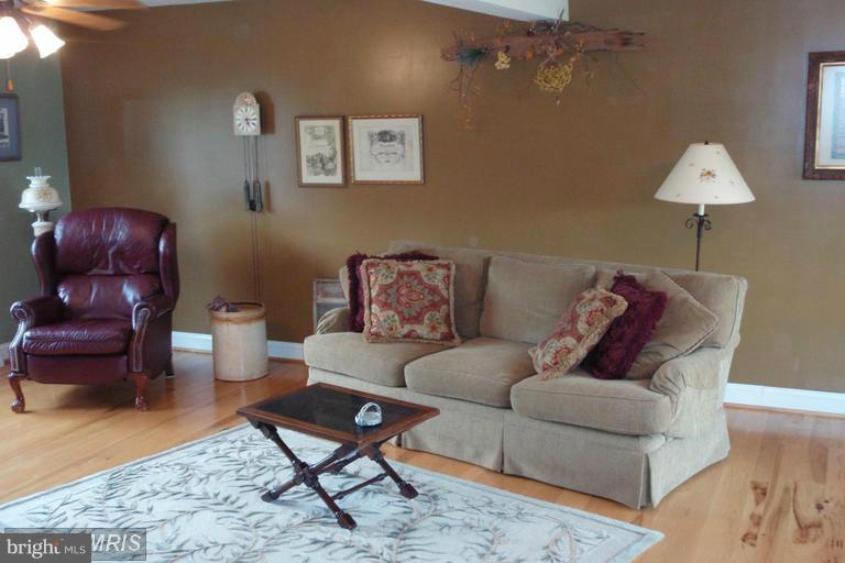 2402 Hoffman Road Greencastle, PA 17225 - Photo 4 of 22 a living room with furniture and a couch