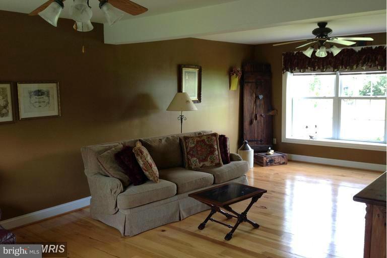 2402 Hoffman Road Greencastle, PA 17225 - Photo 5 of 22 a living room with furniture and a large window