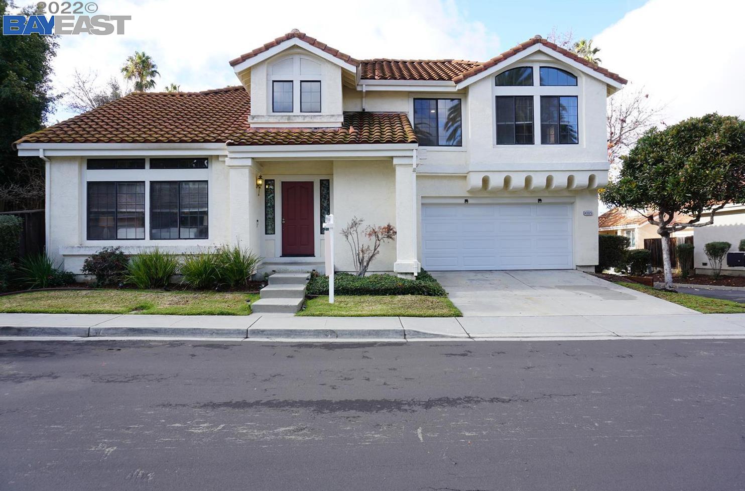a house view with a garden space