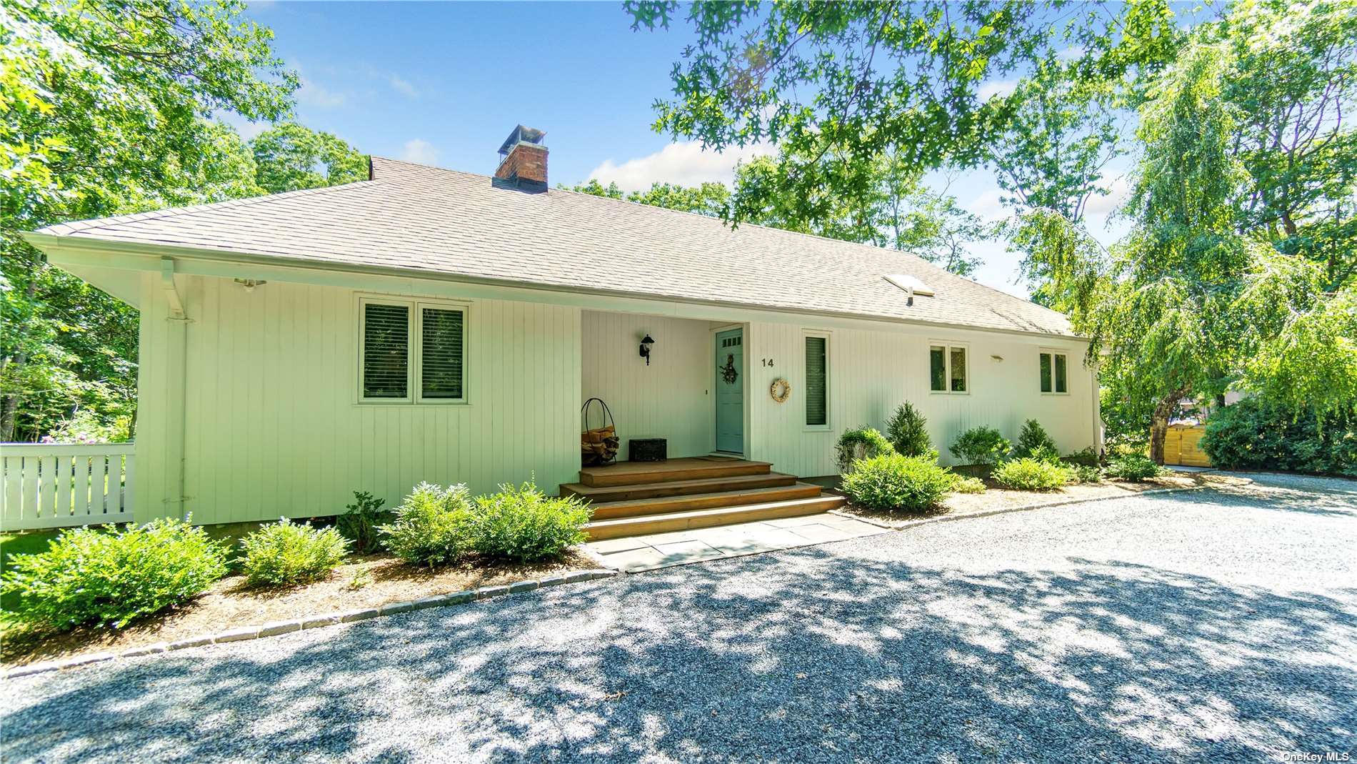 14 North Quarter Road Westhampton, NY 11977 - Photo 1 of 1 a front view of a house with a yard
