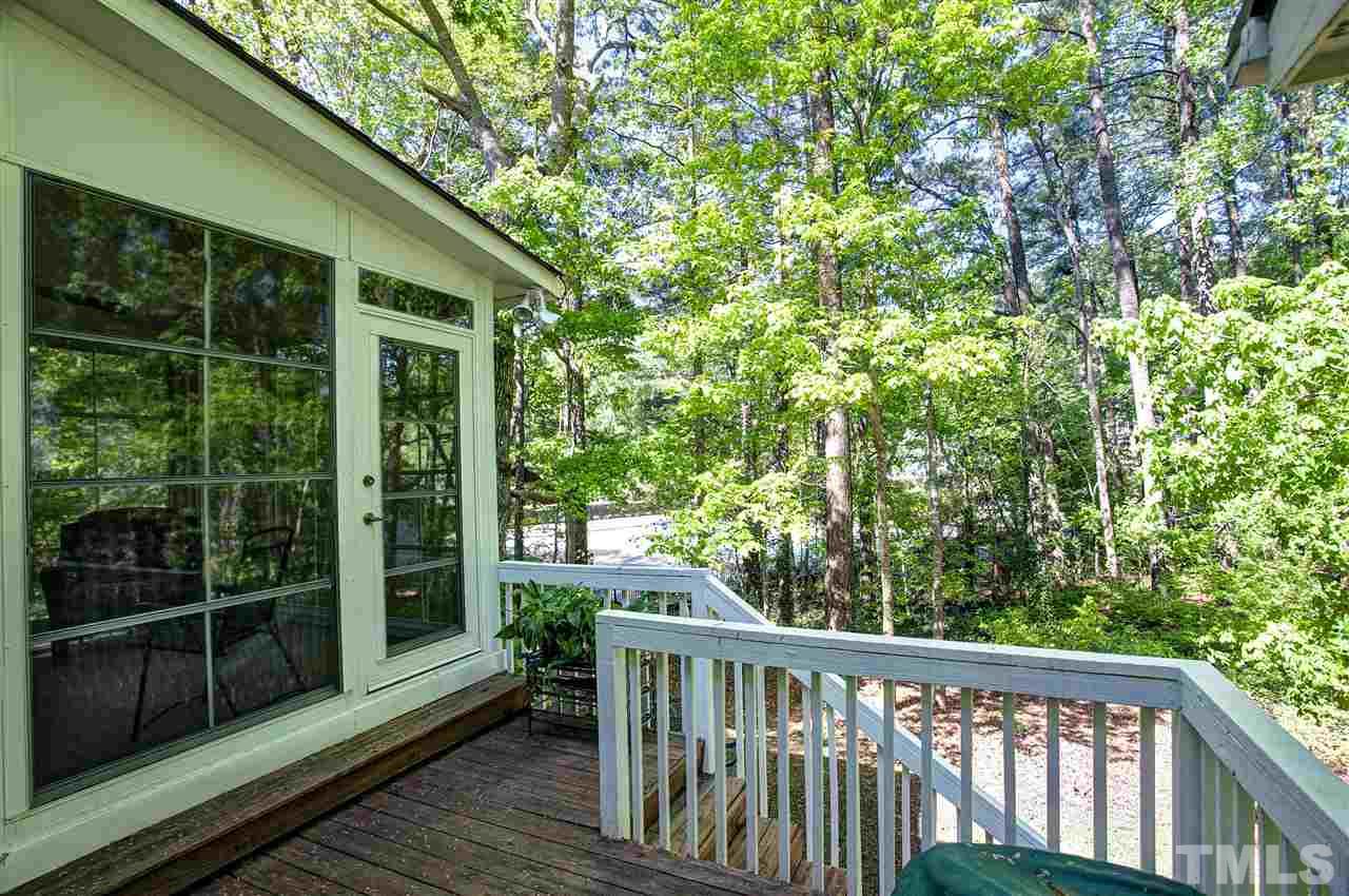 7021 Sandringham Court Raleigh, NC 27613 - Photo 21 of 25 a view of balcony with deck and outdoor space