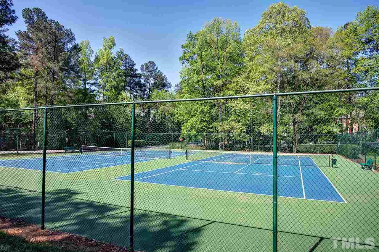 7021 Sandringham Court Raleigh, NC 27613 - Photo 25 of 25 a view of a tennis court