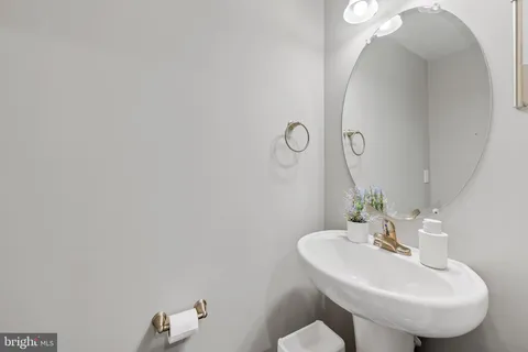 a kitchen with stainless steel appliances granite countertop a refrigerator a stove a sink a microwave and cabinets