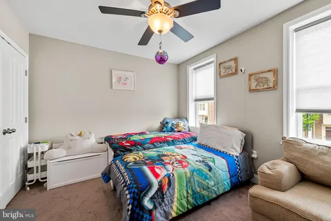 a view of a hallway with washer and dryer
