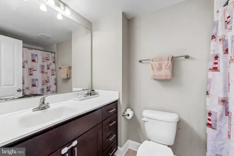 a bathroom with a sink and toilet