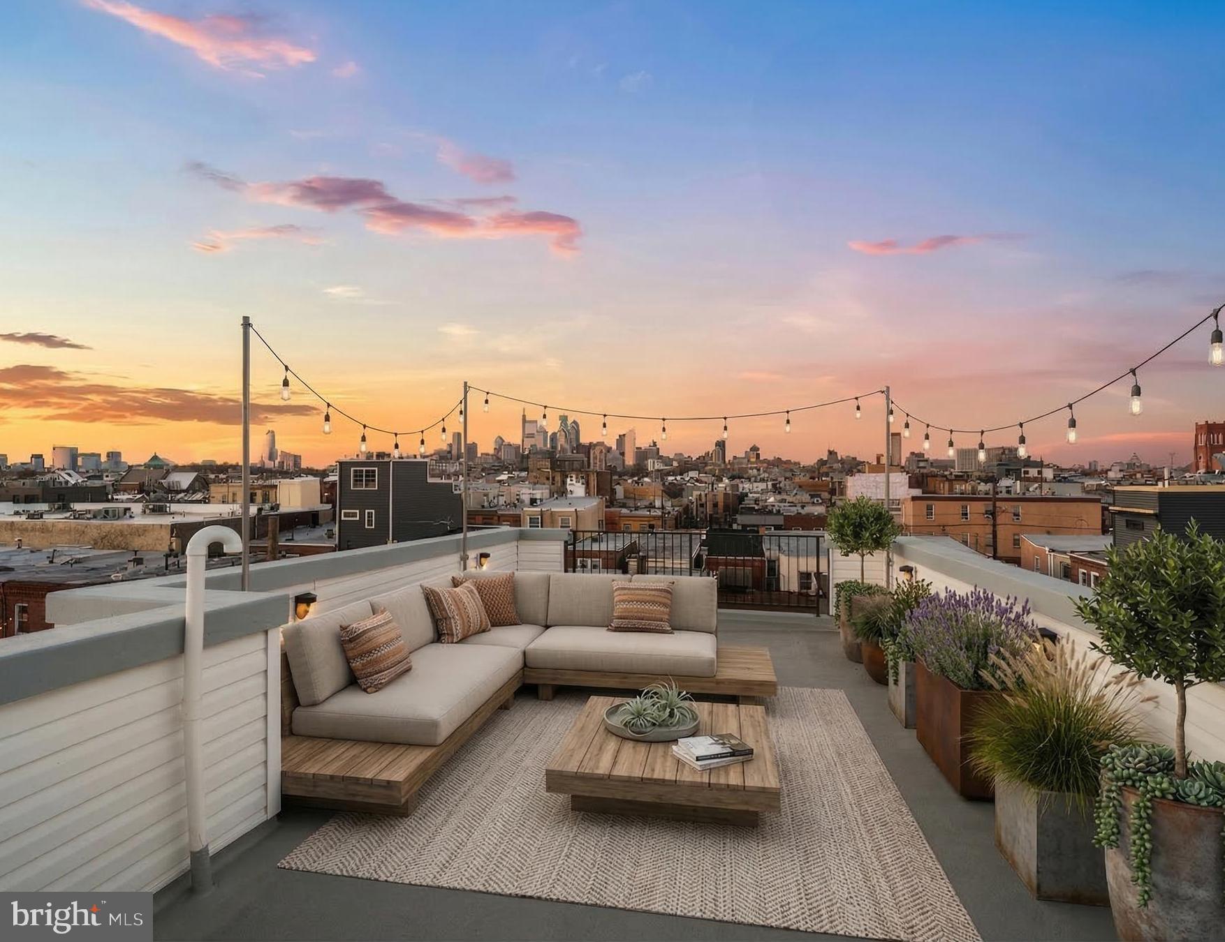 1106 Watkins Street Philadelphia, PA 19148 - Photo 16 of 38 a terrace with outdoor seating and city view