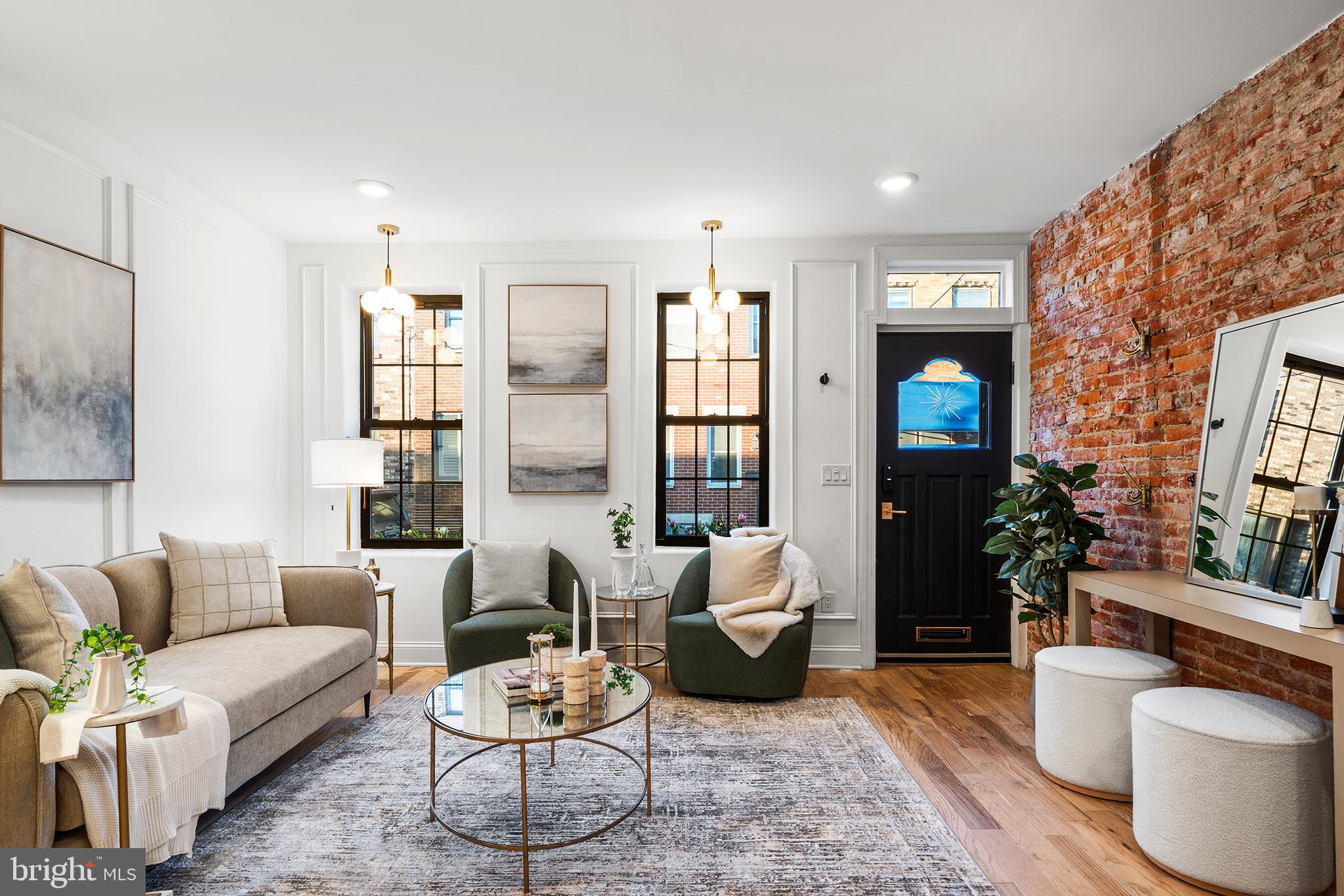 1106 Watkins Street Philadelphia, PA 19148 - Photo 2 of 38 a living room with furniture and a large window