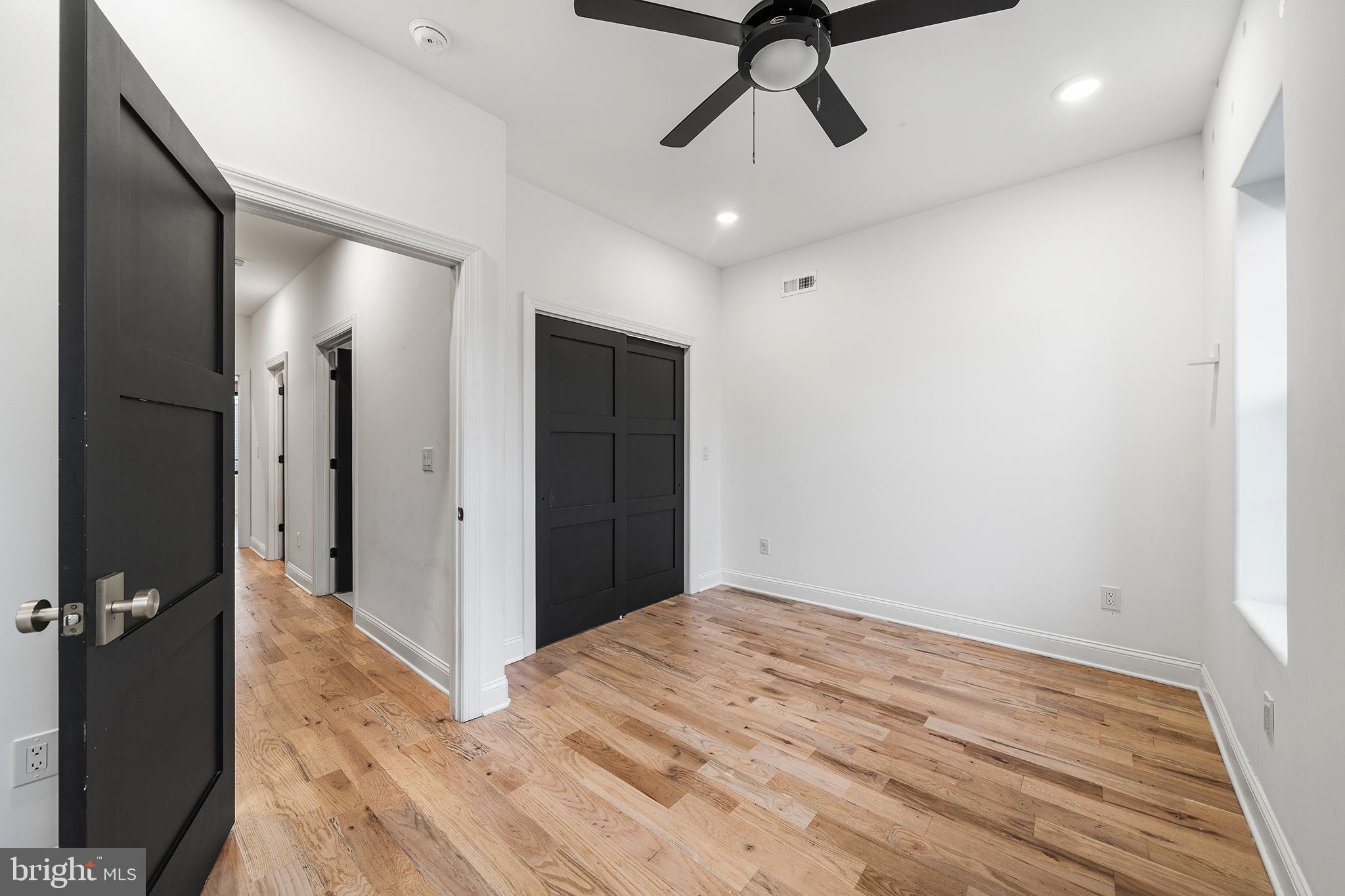 1106 Watkins Street Philadelphia, PA 19148 - Photo 27 of 38 wooden floor in a hall with an entryway