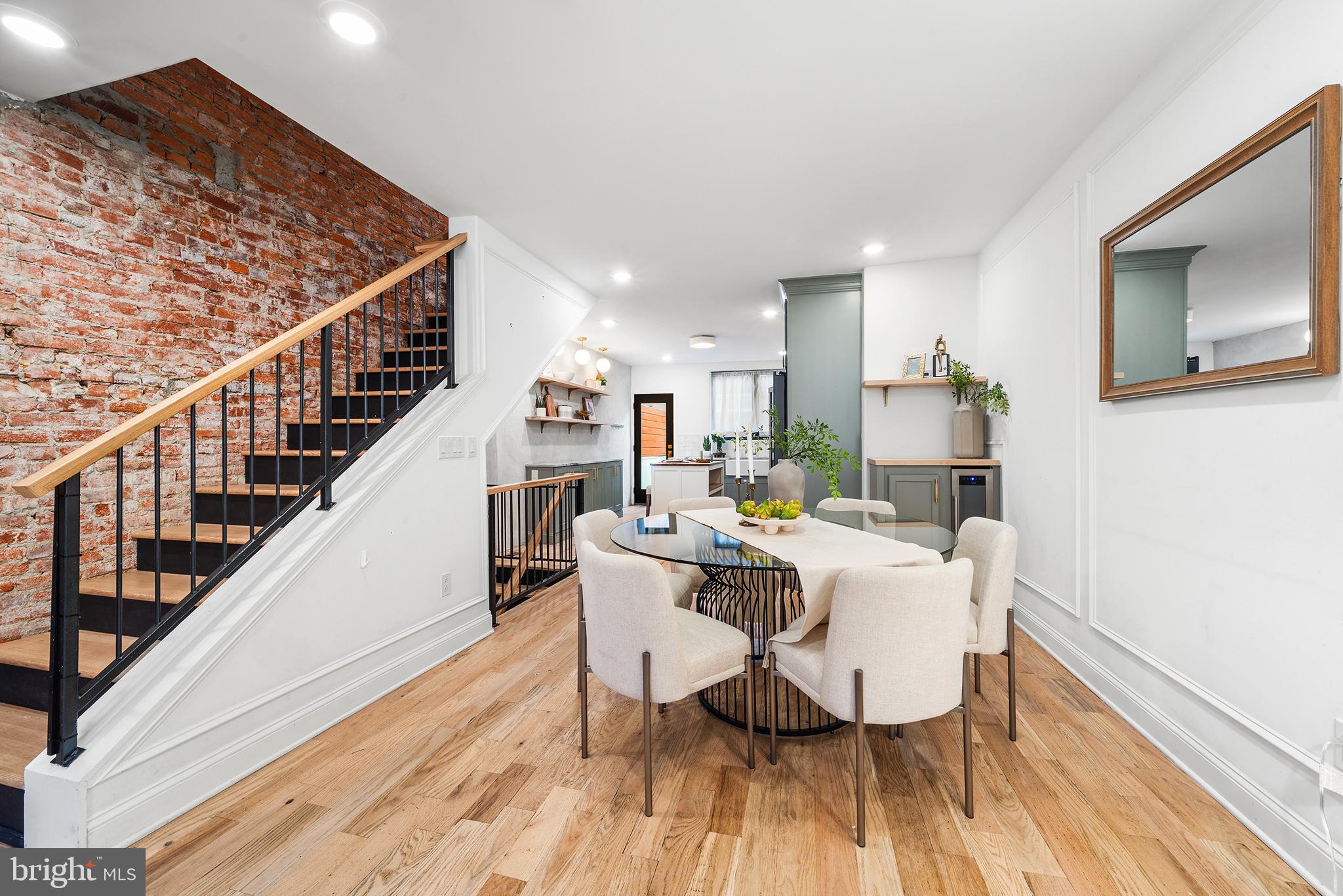 1106 Watkins Street Philadelphia, PA 19148 - Photo 4 of 38 a living room with furniture and a wooden floor