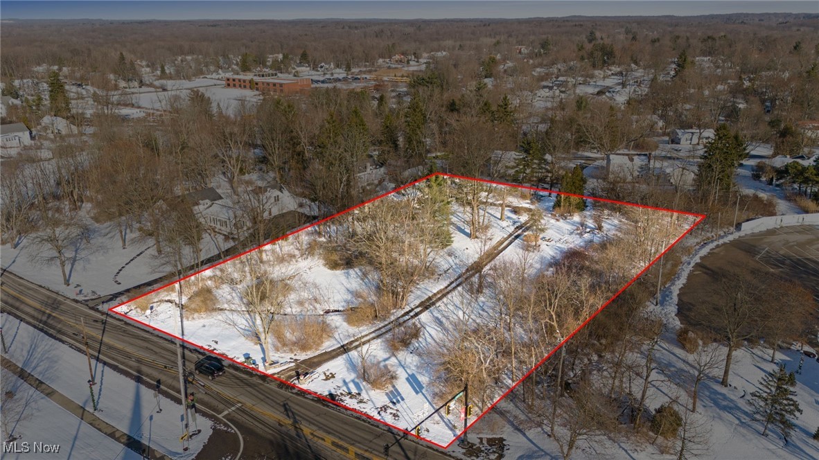 123 South Chillicothe Road Aurora, OH 44202 - Photo 41 of 46 Snowy aerial view featuring property parcel outlined and a forest view