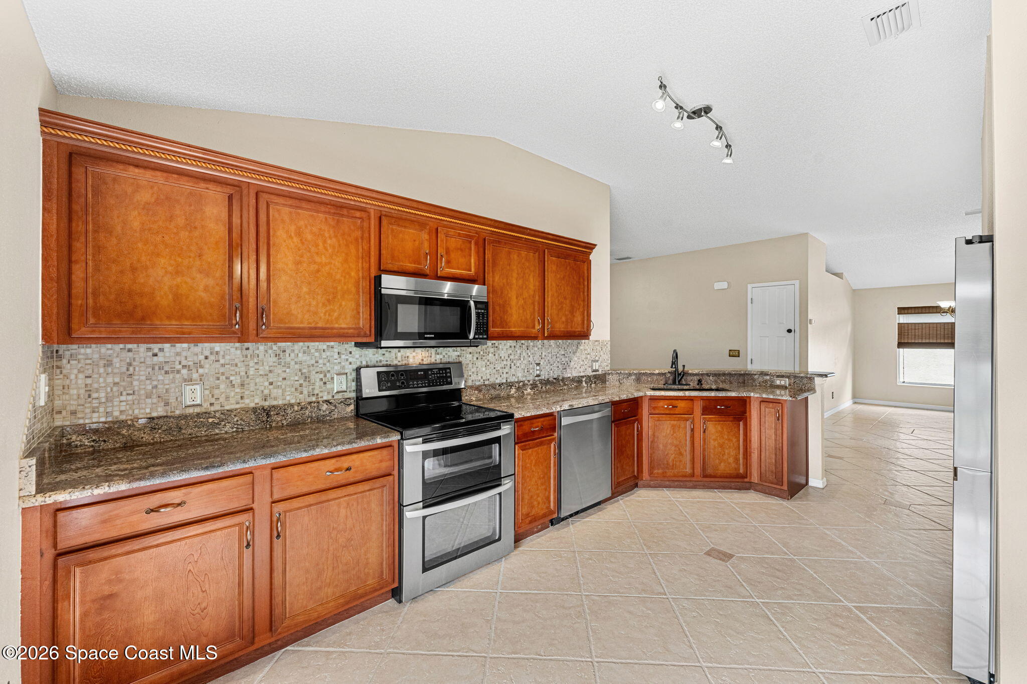 4741 Decatur Circle Melbourne, FL 32934 - Photo 16 of 45 Spacious Kitchen