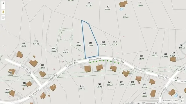 a white and black umbrella with white walls