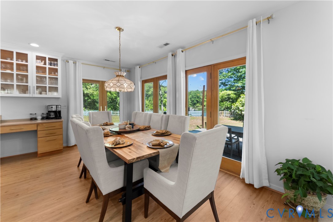 437 Plainview Road Kinsale, VA 22488 - Photo 18 of 63 a dining room with furniture window wooden floor