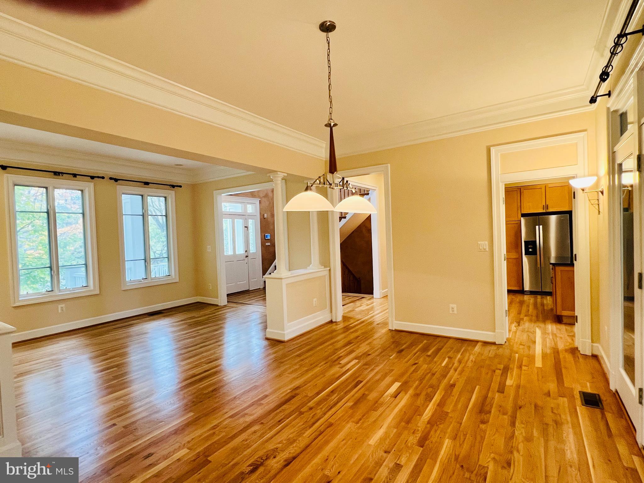 1312 Kurtz Road McLean, VA 22101 - Photo 16 of 62 a view of a room with wooden floor ceiling fan and window
