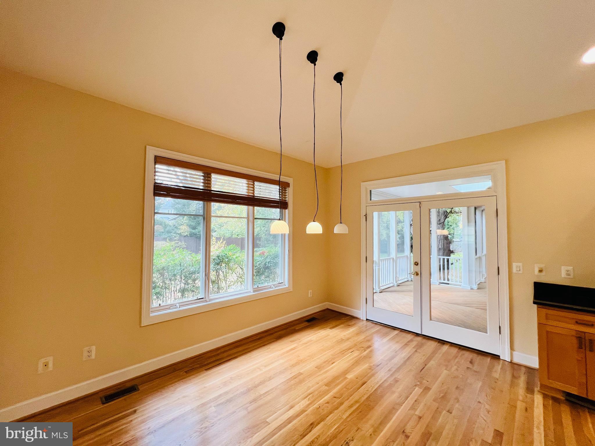 1312 Kurtz Road McLean, VA 22101 - Photo 19 of 62 a view of an empty room with window and wooden floor