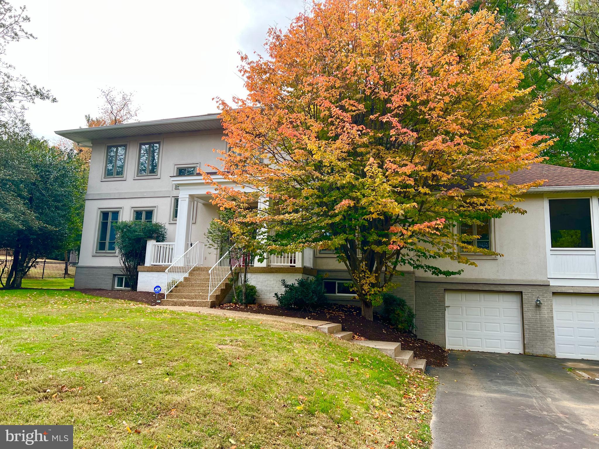 1312 Kurtz Road McLean, VA 22101 - Photo 2 of 62 a view of a house with a patio and a yard