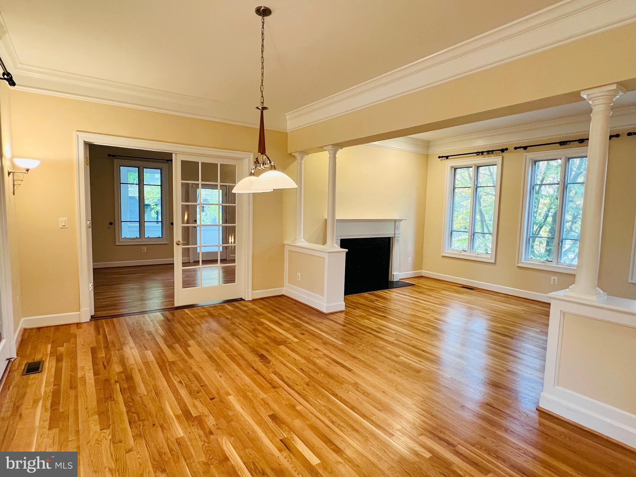 1312 Kurtz Road McLean, VA 22101 - Photo 27 of 62 a view of empty room with wooden floor and fireplace