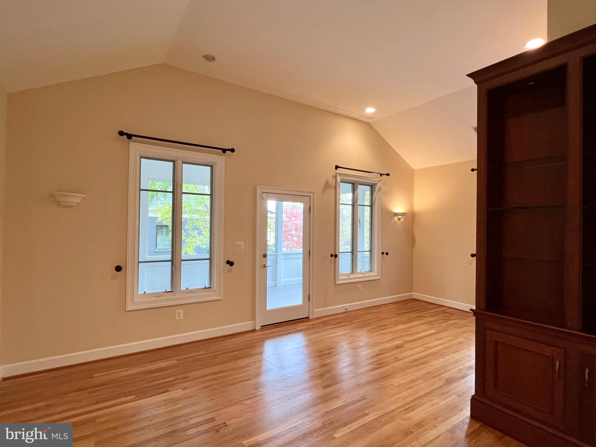 1312 Kurtz Road McLean, VA 22101 - Photo 28 of 62 a view of an empty room with wooden floor and a window