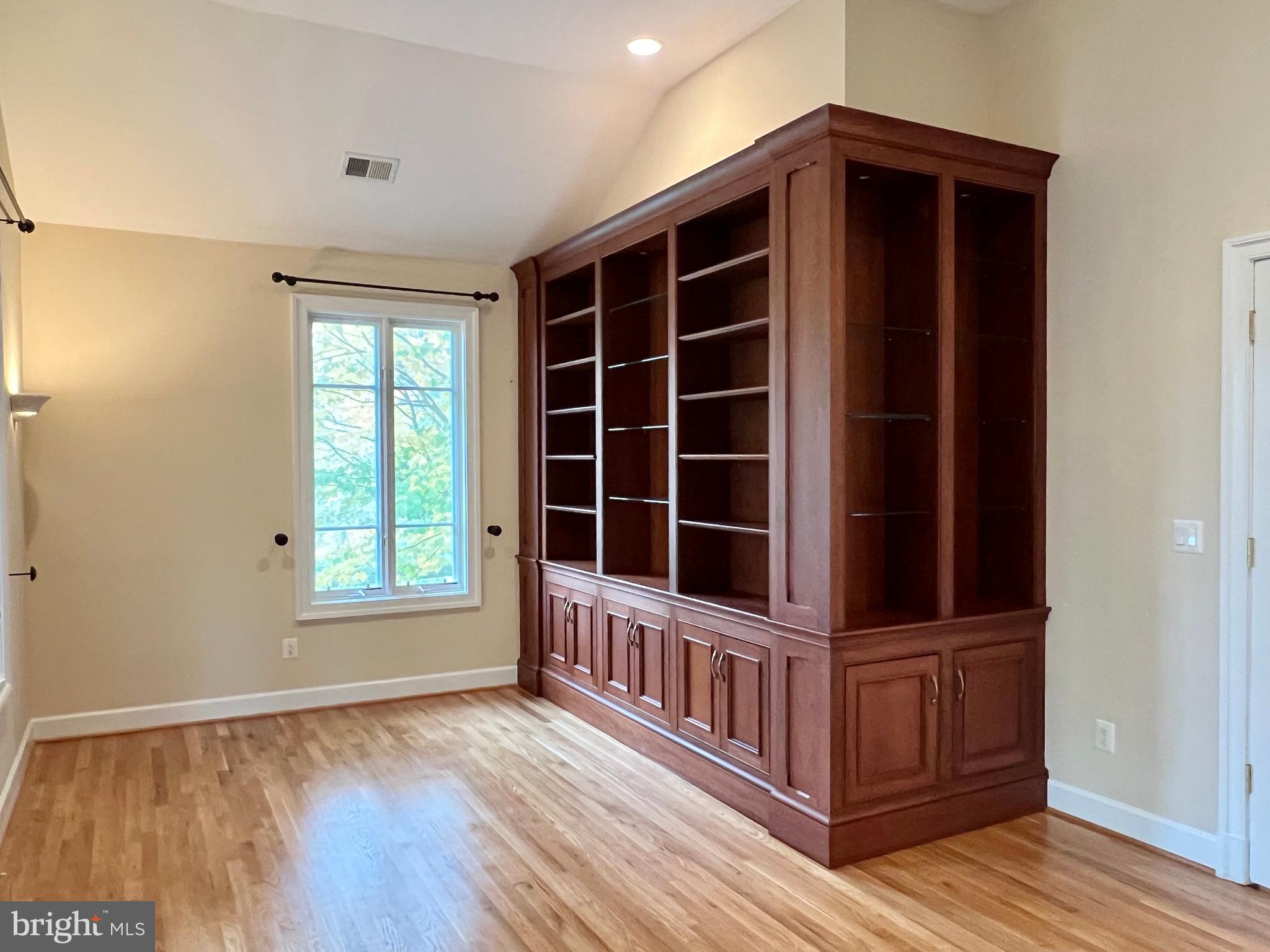 1312 Kurtz Road McLean, VA 22101 - Photo 29 of 62 an empty room with wooden floor and windows