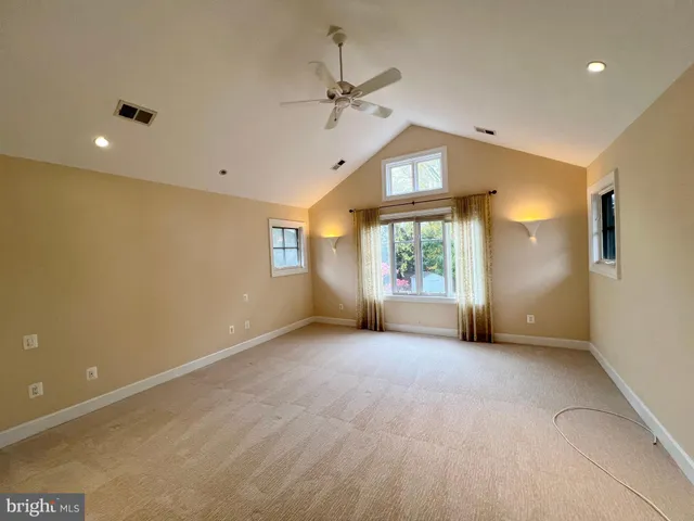 a view of balcony with wooden floor