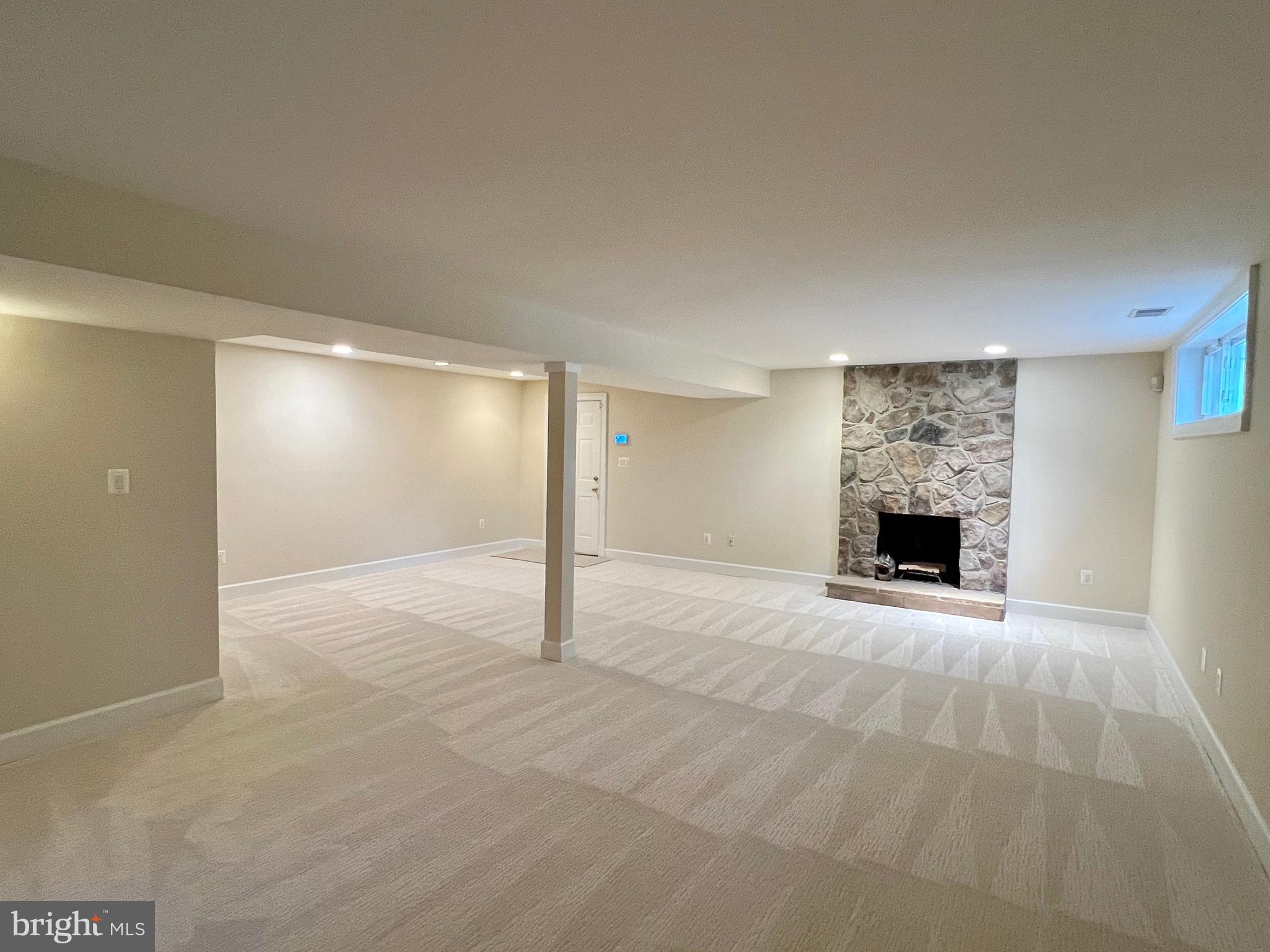 1312 Kurtz Road McLean, VA 22101 - Photo 49 of 62 a view of an empty room with a fireplace