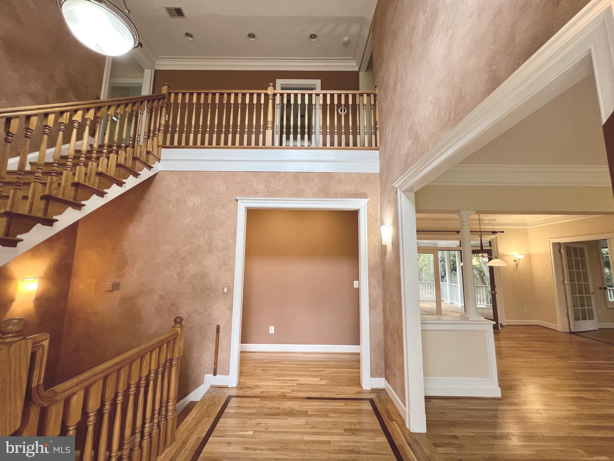 1312 Kurtz Road McLean, VA 22101 - Photo 5 of 62 a view of a hallway with wooden floor