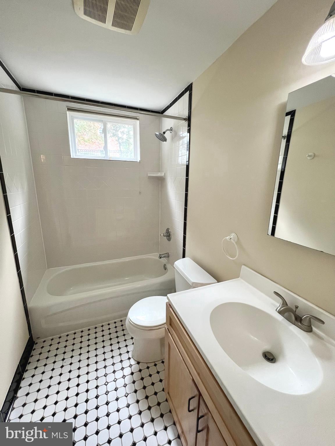 1312 Kurtz Road McLean, VA 22101 - Photo 54 of 62 a bathroom with a sink a toilet and shower