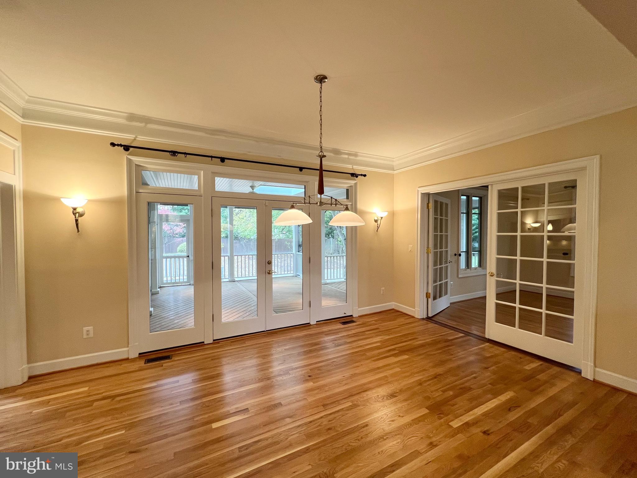 1312 Kurtz Road McLean, VA 22101 - Photo 10 of 62 a view of an empty room with wooden floor and a window