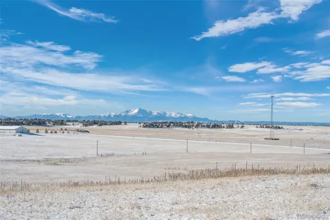 a view of a lake with a beach
