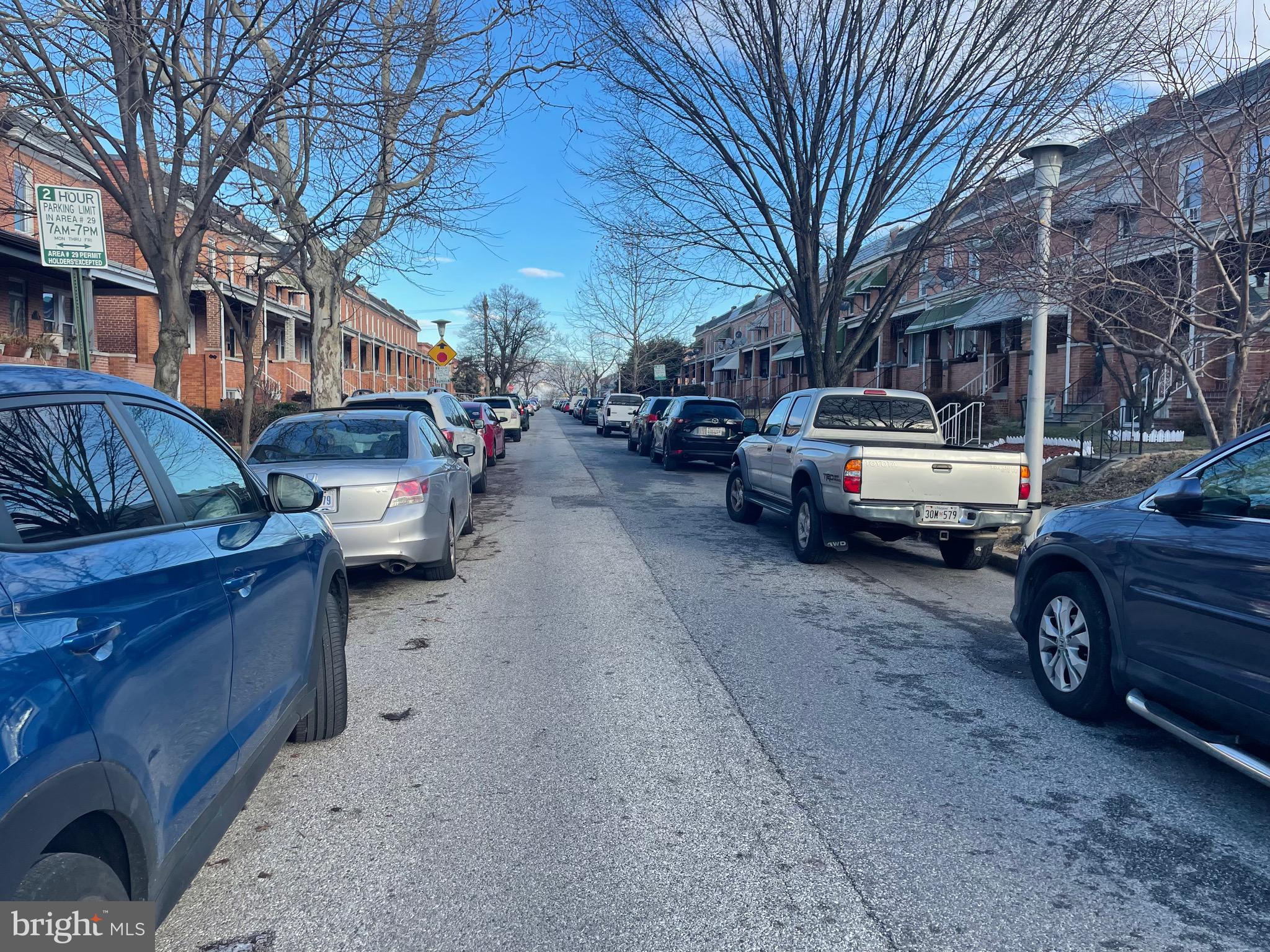 440 Elrino Street, Unit 2 Baltimore, MD 21224 - Photo 2 of 11 a view of a car parked in front of a brick house