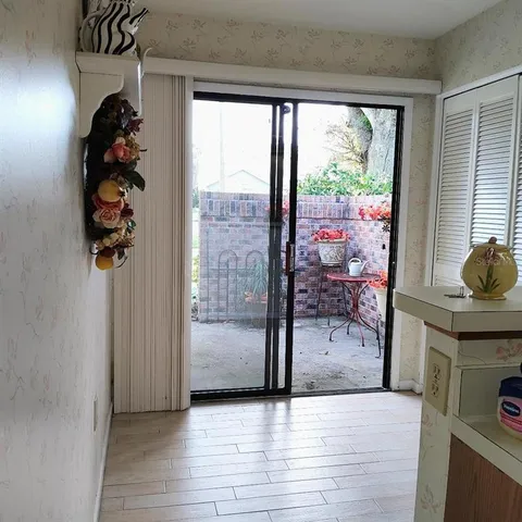 a kitchen with stainless steel appliances a stove a microwave and sink