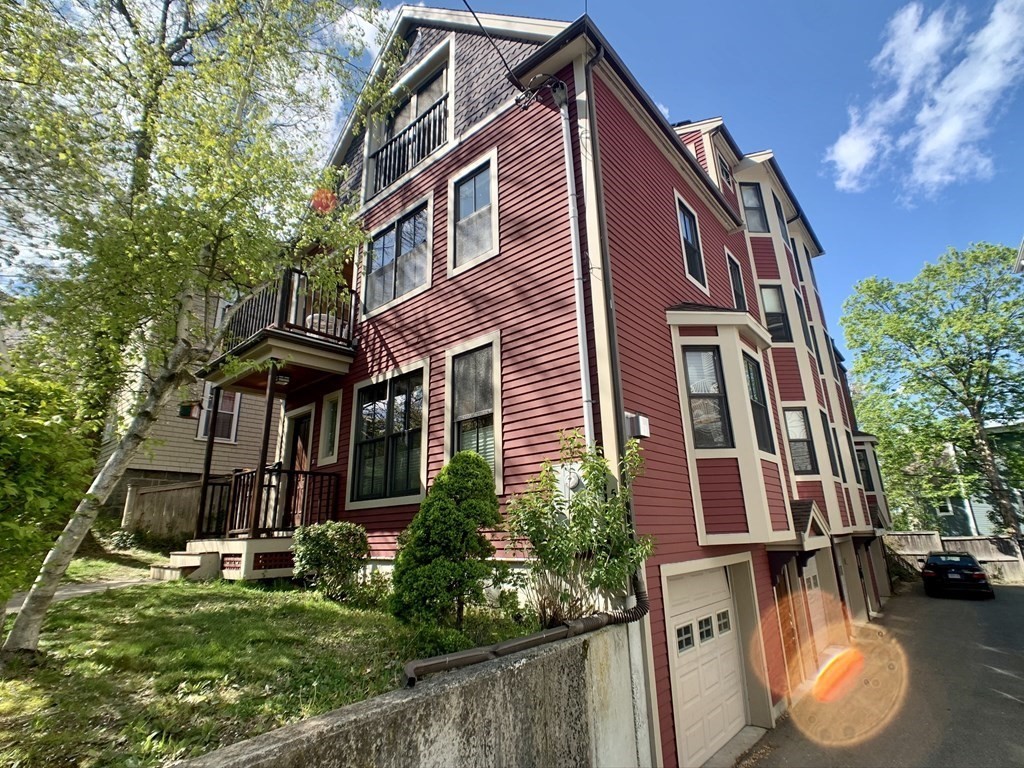 a front view of a multi story residential apartment buildings