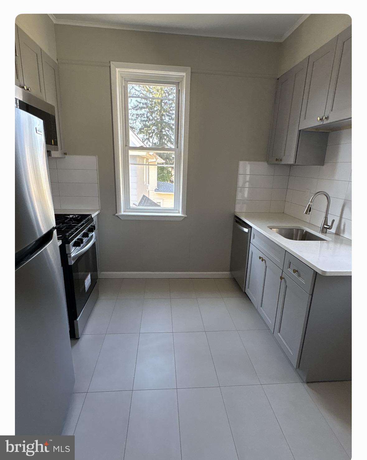 109 Union Avenue Stratford, NJ 08084 - Photo 2 of 10 Modern kitchen with sleek finishes.