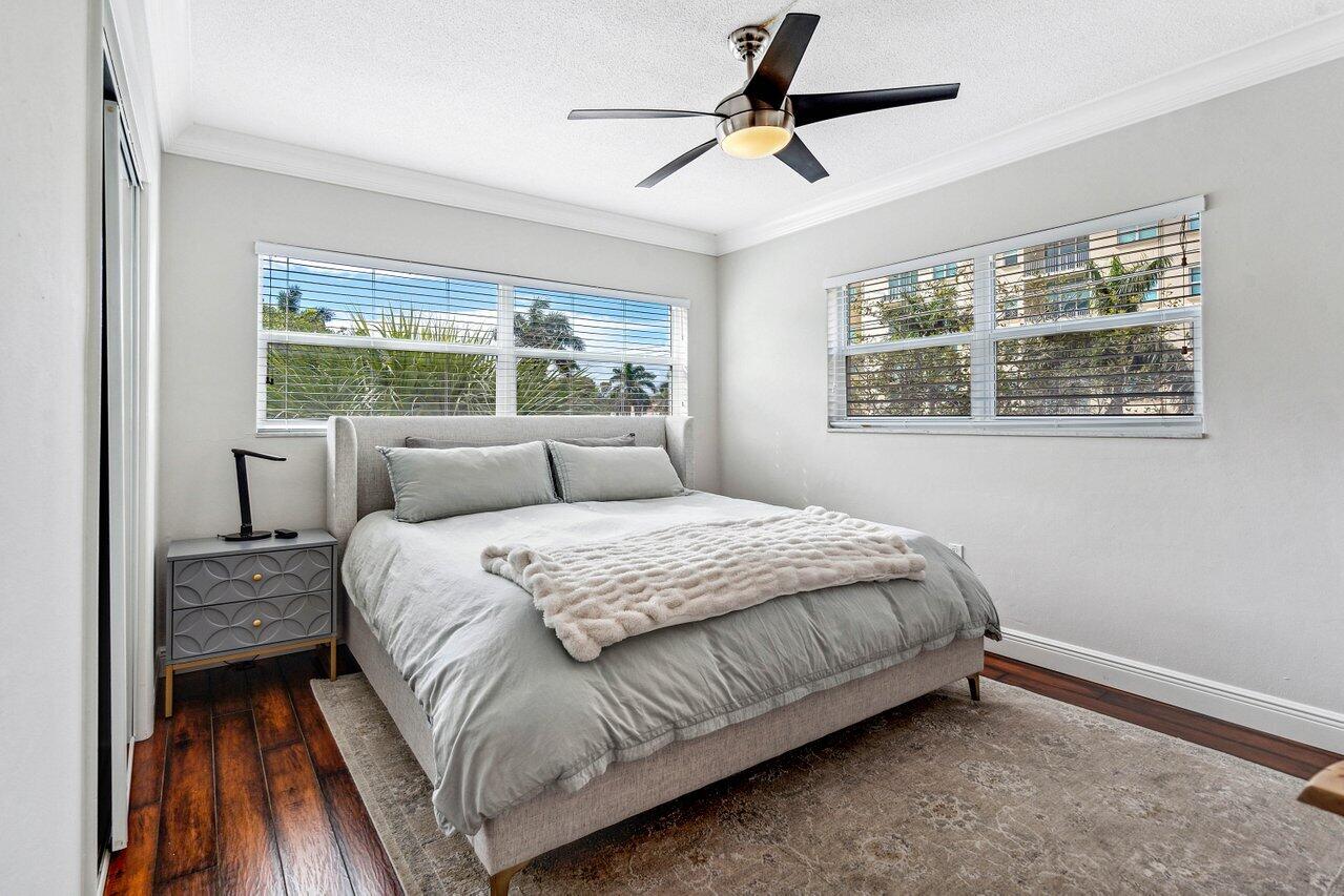 200 East Royal Palm Road, Unit 3120 Boca Raton, FL 33432 - Photo 12 of 27 a bedroom with a large bed and a window