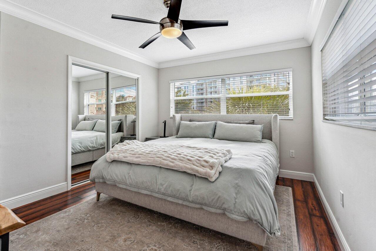 200 East Royal Palm Road, Unit 3120 Boca Raton, FL 33432 - Photo 13 of 27 a bedroom with a large bed and a window