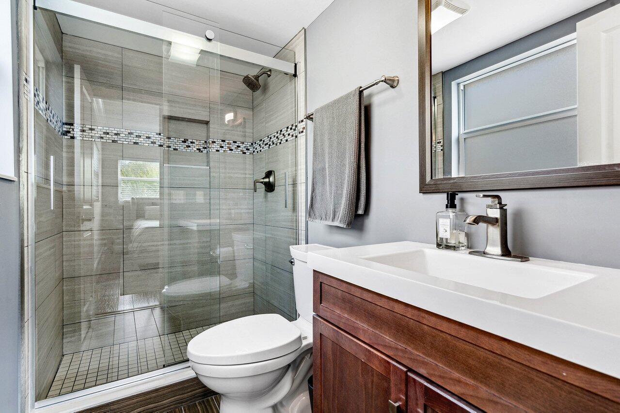 200 East Royal Palm Road, Unit 3120 Boca Raton, FL 33432 - Photo 15 of 27 a bathroom with a sink toilet and shower