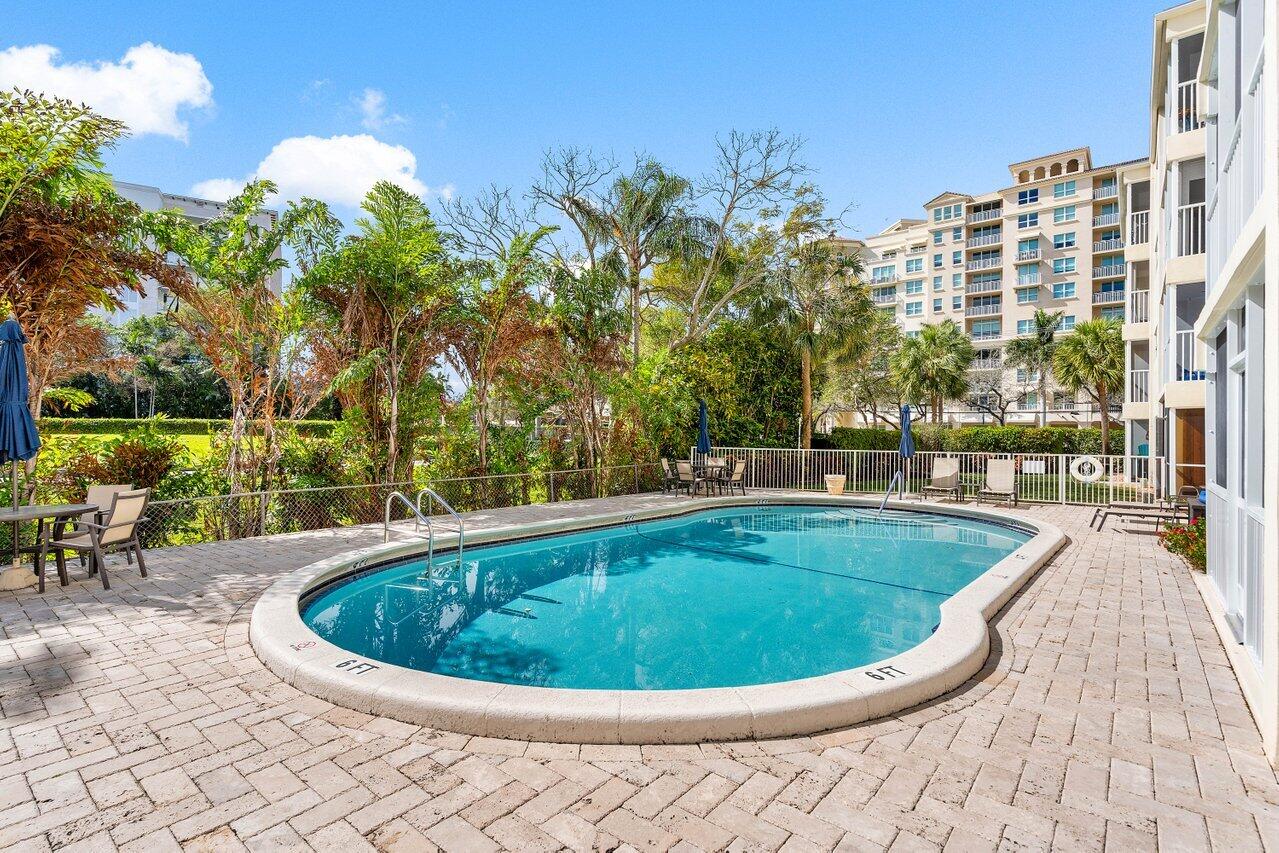 200 East Royal Palm Road, Unit 3120 Boca Raton, FL 33432 - Photo 18 of 27 a view of a swimming pool with outdoor seating