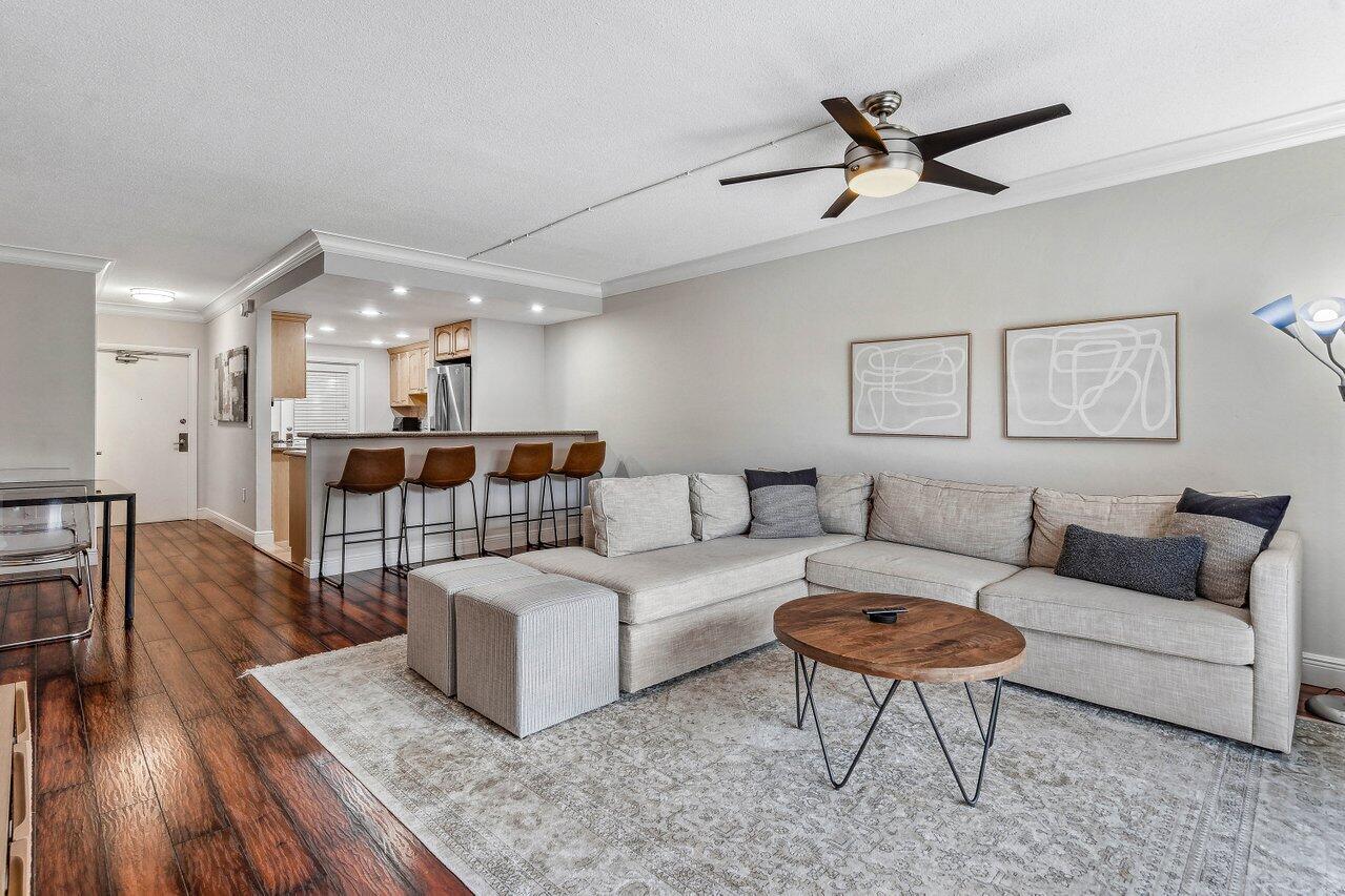 200 East Royal Palm Road, Unit 3120 Boca Raton, FL 33432 - Photo 7 of 27 a living room with furniture and a wooden floor