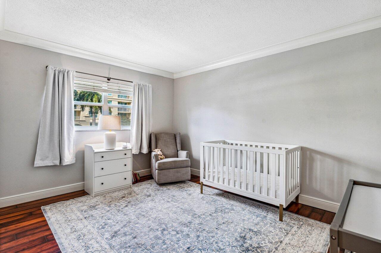 200 East Royal Palm Road, Unit 3120 Boca Raton, FL 33432 - Photo 9 of 27 a view of a bedroom with furniture and window