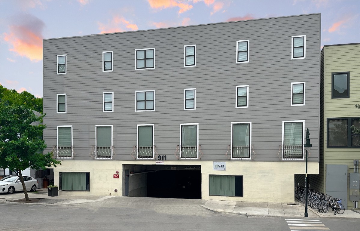 911 West 22nd Street, Unit 305 Austin, TX 78705 - Photo 1 of 15 a building with a window and balcony
