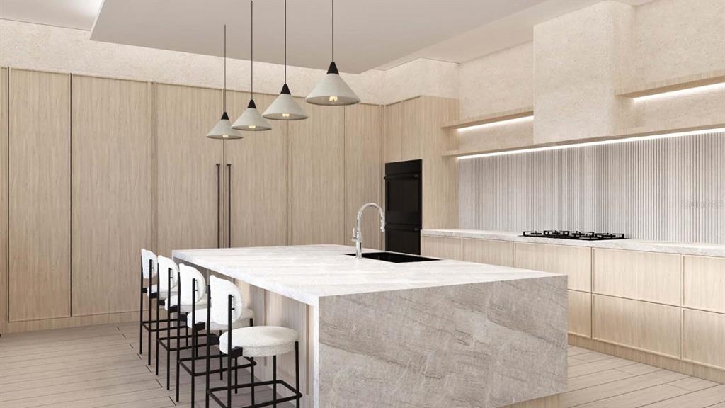 9662 Blandford Road Orlando, FL 32827 - Photo 11 of 22 a kitchen with stainless steel appliances kitchen island a chandelier