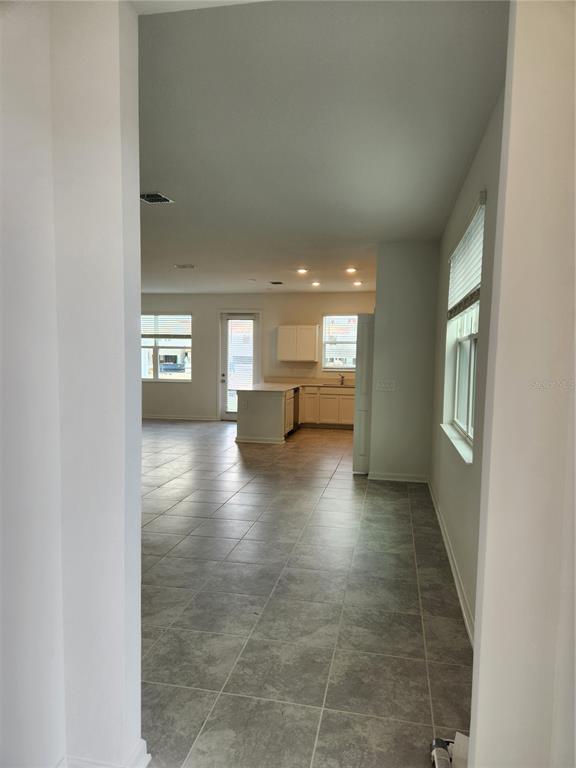 203 Bogey Drive Davenport, FL 33896 - Photo 4 of 41 a view of livingroom and window