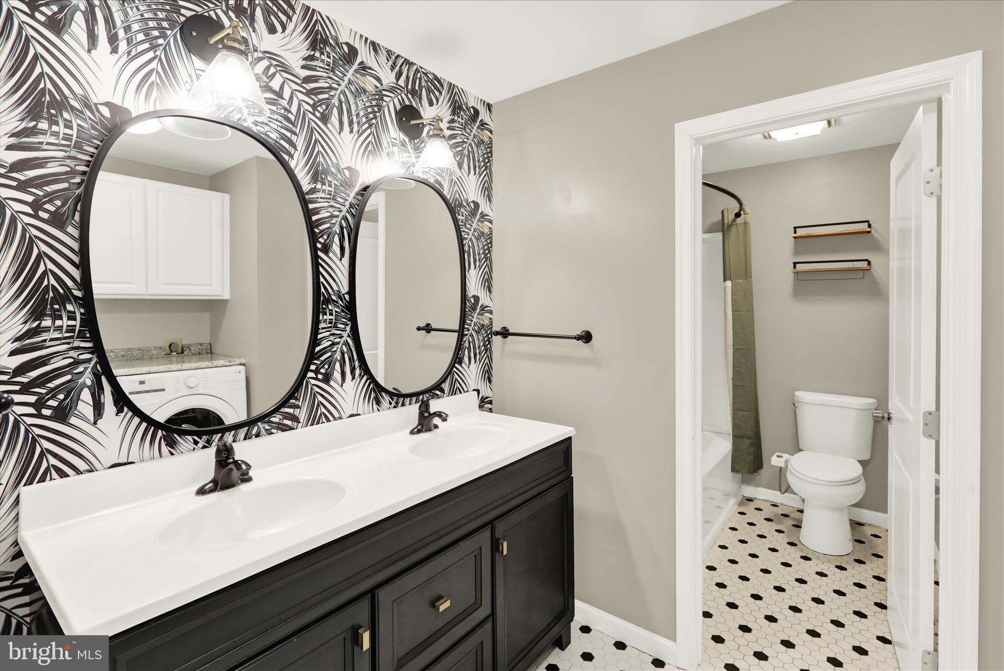 302 South Tulpehocken Road Reading, PA 19601 - Photo 26 of 44 a bathroom with a sink a toilet and a mirror